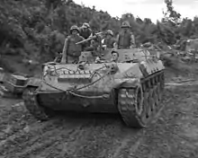 A U.S. Army M39 assists U.S. Marines picking up casualties on 25 July 1953 during an attack against Hill 111, also known as "Boulder City", during the Battle of the Samichon River during the Korean War.