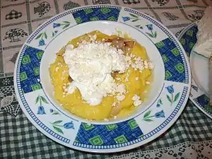 Image 20Mămăligă with cheese and greaves (from Moldovan cuisine)