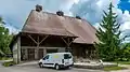 Stork nests on farmhouse