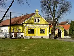 Farmhouse in village's center