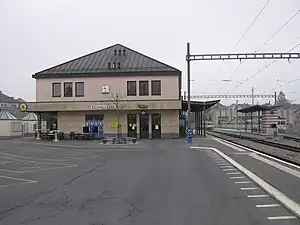 Two-story building with hipped roof