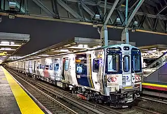 A Long Island Rail Road M9, showing both over-running and under-running third rail shoes.