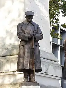 statue wearing Royal Navy uniform