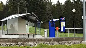 Covered shelter next to side platform