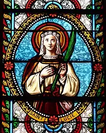 Sainte Lucy, stained glass window, Church of Saint-Joseph, La Coquille, Dordogne, France.