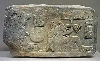 A relief of the Crown showing a scene from the Mesoamerican Ball Game.