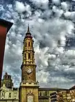 A tower of reddish stone.