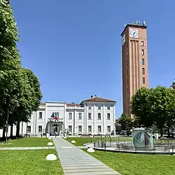 Marconi square with garden, fountain, Town Hall - Clock Tower on the right side