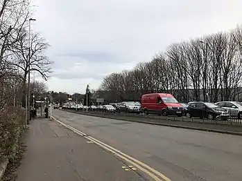 Traffic outside Cameron Toll Shopping Centre on Lady Road, Edinburgh.