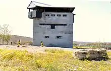 This blockhouse stands some 14 km north of Laingsburg at a point where the national road and the railway line cross a tributary of the Buffalo River.
It is one of the best preserved examples of the blockhouses built during the Anglo-Boer War (1899–1902).
This blockhouse belongs to the type that was erected to protect key positions and especially bridges.
It is a double-storeyed stone building
Type of site: Blockhouse
Previous use: Fortification.
A very fine example of the blockhouses erected during the Anglo-Boer War.