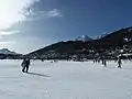 Frozen Lake St. Moritz and St. Moritz town in winter