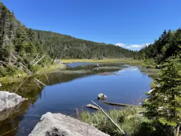 The hydrologic source of the Hudson River is near or at Lake Tear of the Clouds, a small tarn in the Adirondacks.