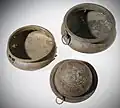 Two bronze bowls and wine strainer from the Langstone Hoard