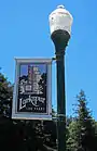 street banner celebrating the 100th anniversary of Larkspur