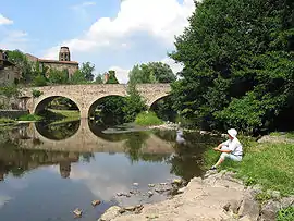 Bridge on the Senouire River and St. André abbey.