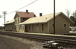 Bottom: The depot after the centennial, with bright yellow and red colors