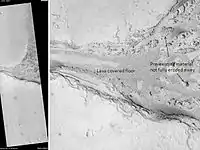 Lethe Vallis, as seen by HiRISE.  Flow was from southwest to northeast.  Wider part of Lethe Vallis had less erosive power, so mesas are left behind from pre-existing material.  Lethe Vallis is a valley in the Elysium quadrangle.  Scale bar is 500 meters long.