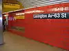 The station sign within Lexington Avenue-63rd Street station in New York