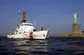 Adak standing watch over New York Harbor.