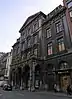 Straatgevel en dak, de promenade op de begane grond, het trappenhuis en het auditorium van de société libre d'Emulation, instelling beschermingszone rondom het place du XX Août en de gevels van de gebouwen die er aan grenzen