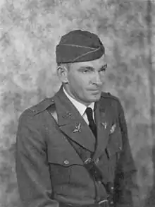 Air Service officer wearing garrison cap and uniform with Sam Browne belt.