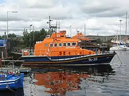 Lifeboats in Arklow Harbour, Ireland. Orange is chosen for lifeboats and lifesaving jackets because of its high visibility.