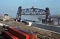 Lift span in raised position with towboat "Jim D" passing underneath