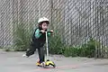 A Mini Micro scooter with three wheels