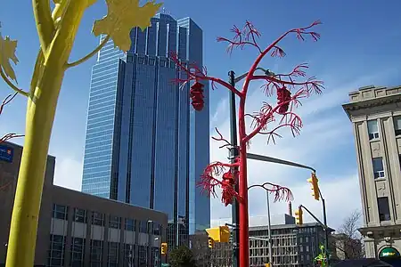 One London Place photographed from Dundas and Wellington streets during the day and night