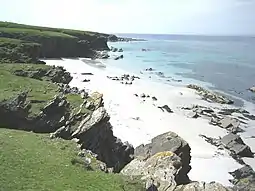 Long Sand, situated on the western side of the island, facing Rapness Sound