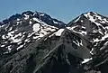 Hal Foss Peak to left with Mount Mystery directly behind. Mount Fricaba to right. Viewed from Marmot Pass.