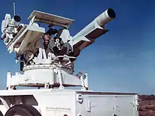 Photographer on an M45 repurposed as camera mount at Lookout Mountain Air Force Station