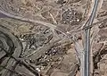 The new (in 2019) Border West Expressway single-point urban interchange – El Paso's first SPUI –  is at Executive Center Blvd., which parallels San Marcos Drive of the La Calavera Historic Neighborhood of Smeltertown.  The Smeltertown Cemetery is visible at the bottom by the expressway.