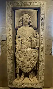 An Image of Louis the Springer grave memorial carved in stone.