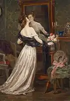 Lady in the boudoir in front of the mirror