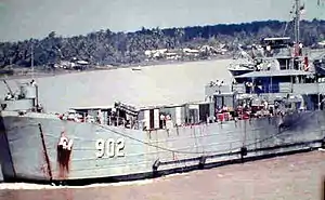 USS Luzerne County (LST-902) underway on the Mekong River, Vietnam, 1968