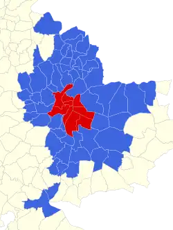 The city (commune) of Lyon (in red) and 58 suburban communes (in blue) make up the metropolitan region.