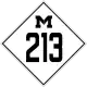 A road sign bearing a diamond enclosing a block M and the number 213