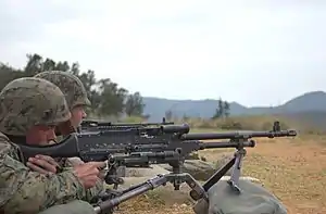 Marines with a tripod-mounted M240G