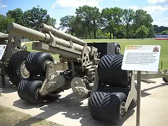 The only surviving prototype M2A2 Terra Star Auxiliary Propelled Howitzer at the Rock Island Arsenal Museum. Note the tri-star wheel system and auxiliary drive system on the right trail leg.