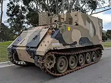 Colour photo of a tracked military vehicle