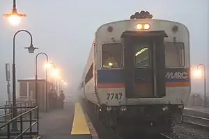 MARC conductors catching up with local news on a foggy morning