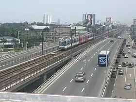 A Joanna Jesh Transport bus unit between the EDSA-Quezon Avenue Flyover