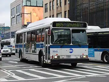 A Q65 bus in Downtown Flushing