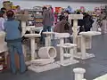 A variety of scratching posts for sale at a cat show