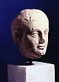 Marble head of a female statue from Elane dated to the 4th century B.C.