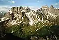 View of the Mädelegabel (2nd peak from right). Left: the Kratzer and left in front of it, the Kemptner Hut