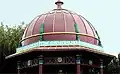 Maharajah's well cupola with wording "His Highness the Maharajah of Benares"