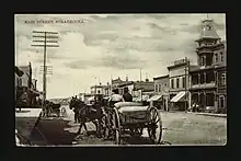 Storefronts along Main Street (later named Whyte Avenue) with a horse and waggon