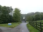 Entrance gate piers and gates about 150m west of Trelowarren House